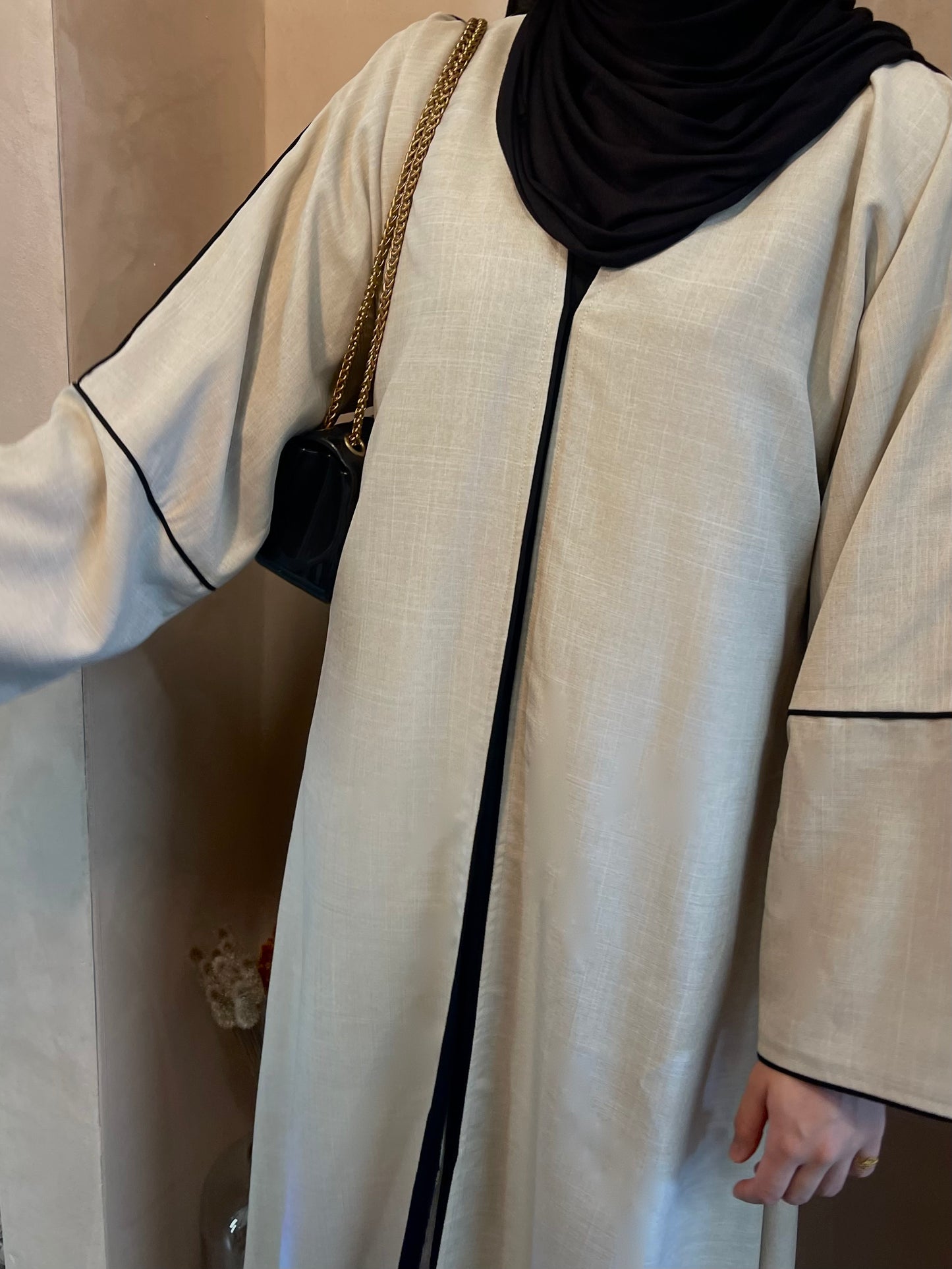 Beige linen open abaya with black piping detail