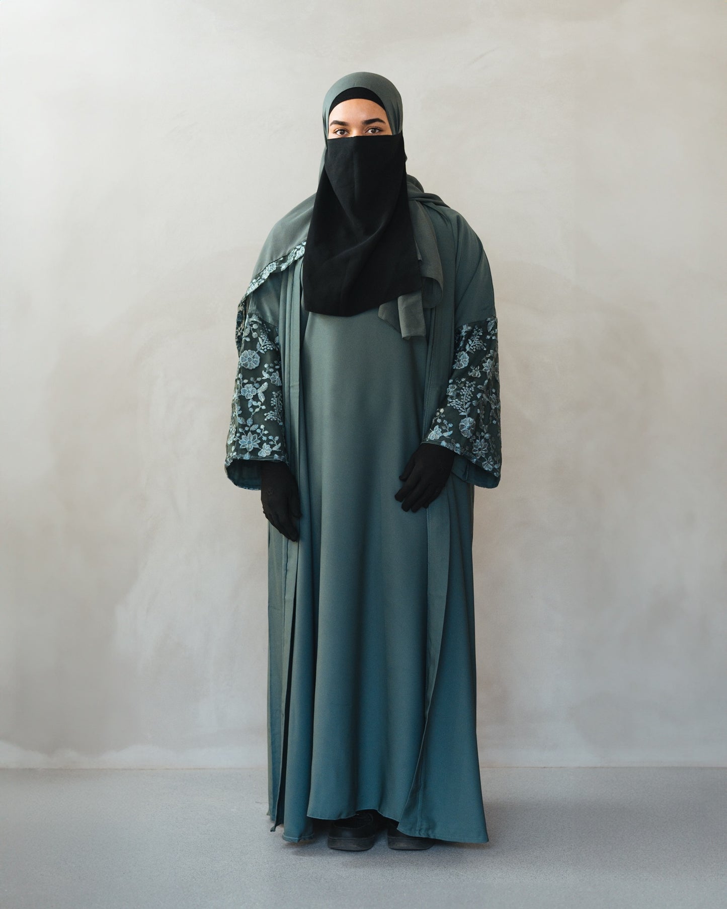 Stale green hand embroidered open abaya with slip dress