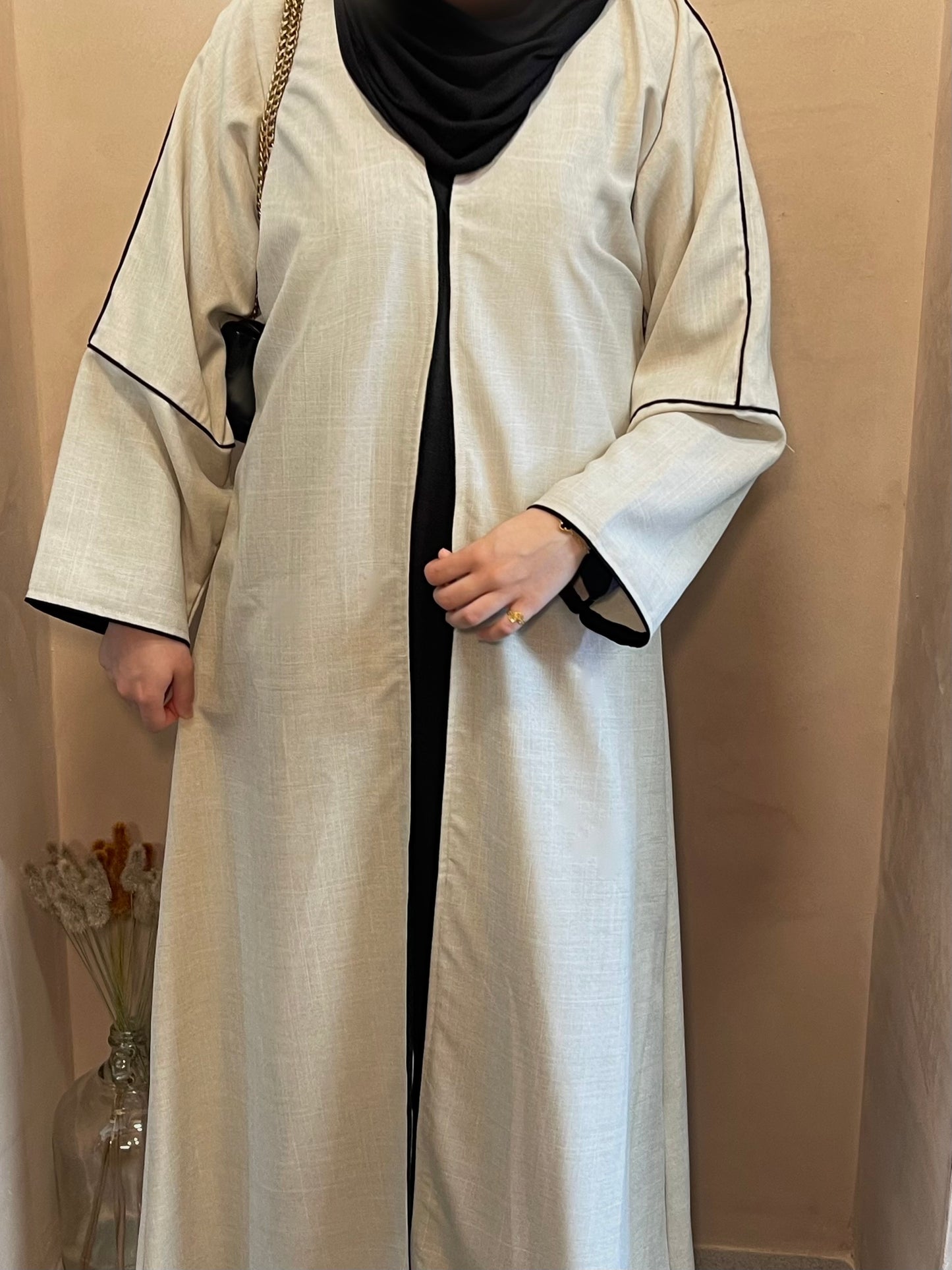 Beige linen open abaya with black piping detail